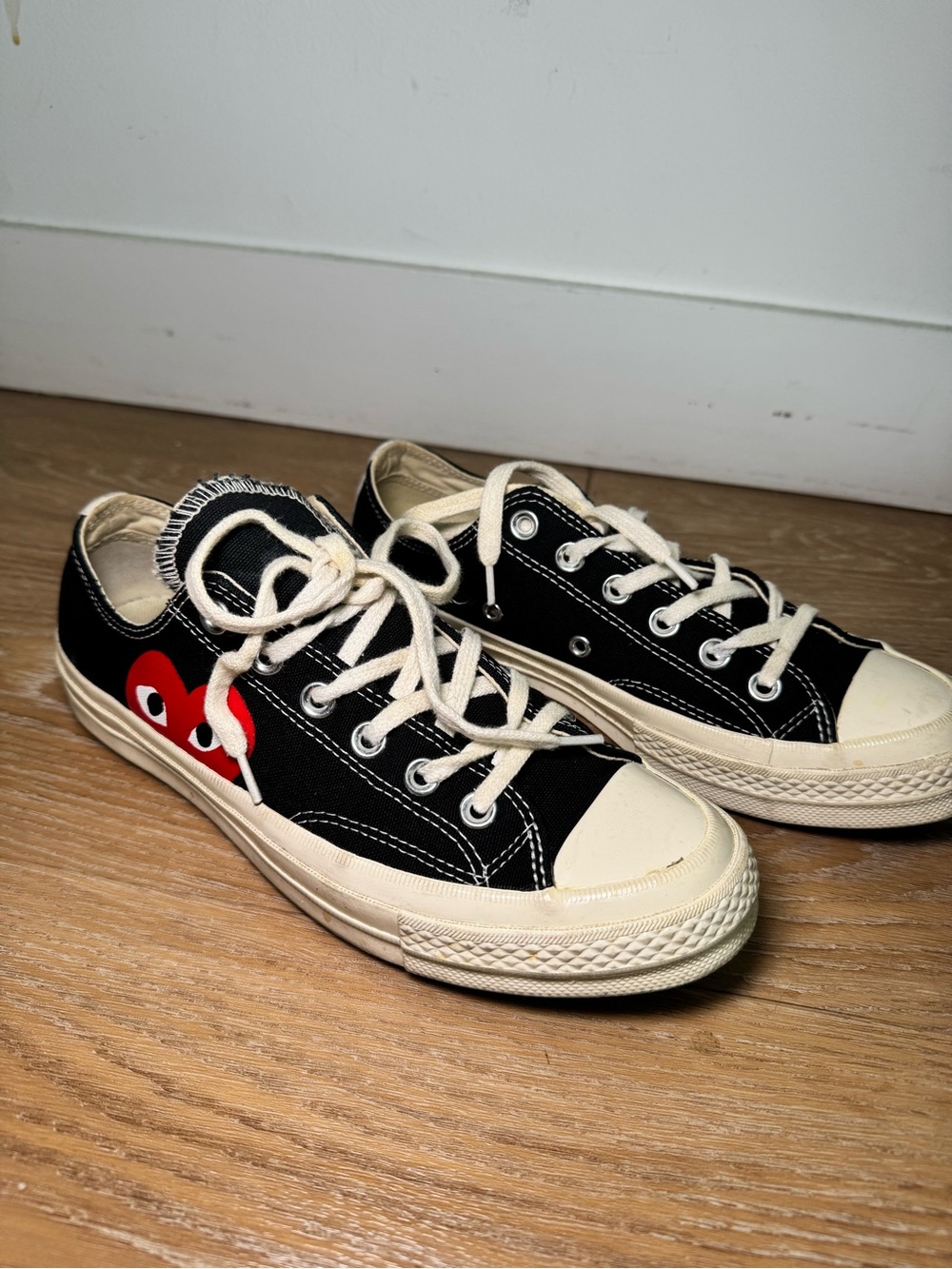 Comme des Garcons Black Low-Top Canvas Sneakers with Red Heart Graphic